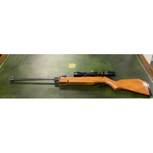 438 - A Webley Vulcan .22 break barrel air rifle with scope and case -