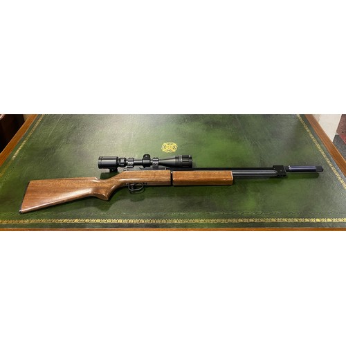 439 - A Sharp model Innova 11 .177 cal pump action air rifle with scope and case -