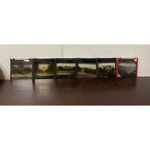 183 - A quantity of glass slides, including American railway/trains, cars cable car etc, together with loo... 