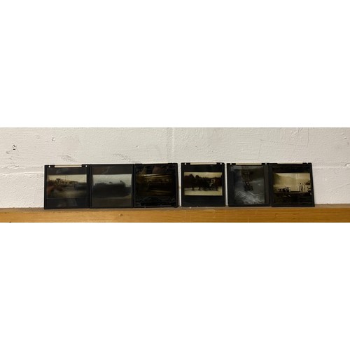 183 - A quantity of glass slides, including American railway/trains, cars cable car etc, together with loo... 