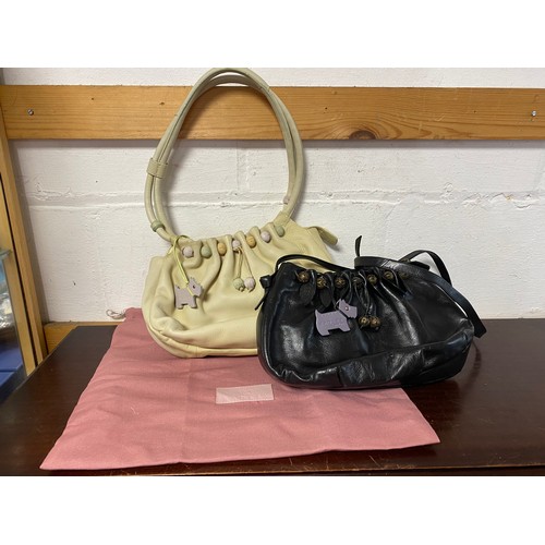 185 - A Radley cream leather handbag, with dustbag, together with another smaller black leather Radley bag... 