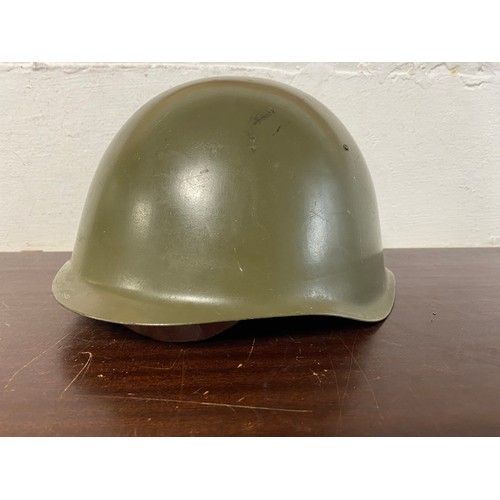 187 - Militaria: a continental helmet -