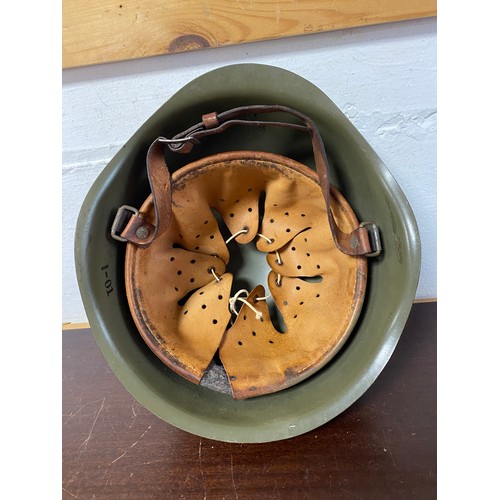 187 - Militaria: a continental helmet -