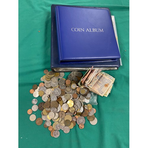 206 - Coins: a quantity of GB and World coinage and an album of banknotes -