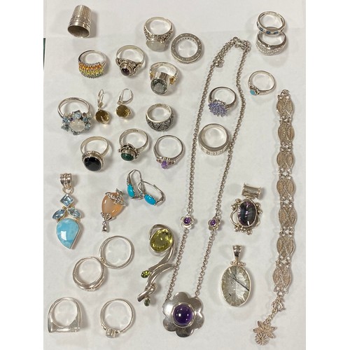 14 - A quantity of mostly modern silver jewellery, including some stone set rings and pendants, filigree ... 