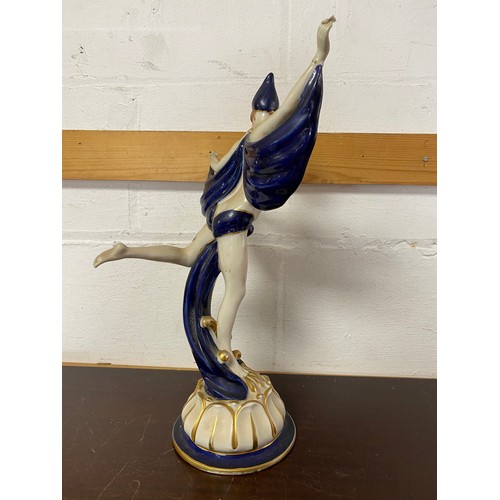 102 - A Royal Dux porcelain model of an Art Deco dancer -