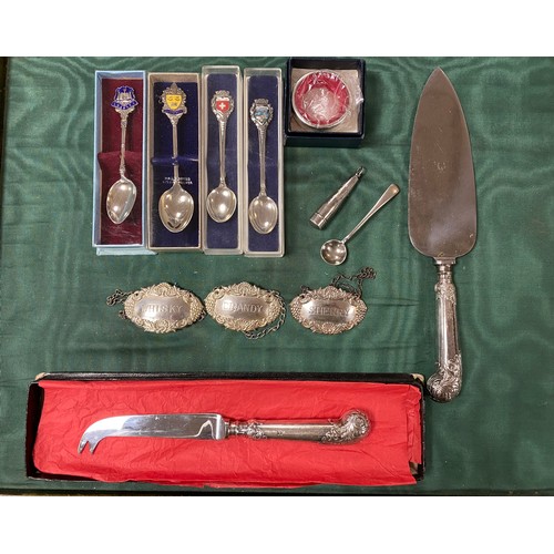 23 - A group of small silver items, various dates and makers, including decanter labels, commemorative sp... 