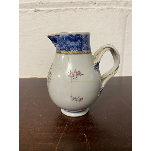 113 - A Chinese export armorial sparrowbead jug, enamelled with swagged and initalled arms and floral deco... 