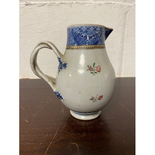 113 - A Chinese export armorial sparrowbead jug, enamelled with swagged and initalled arms and floral deco... 