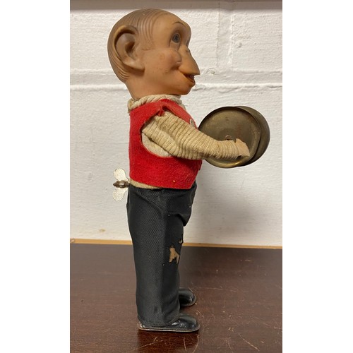 243 - Toys: a Max Carl Original West German keywind clockwork monkey playing the cymbals -