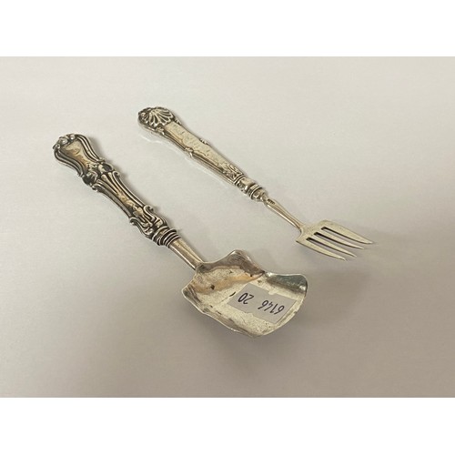 38 - A silver caddy shovel, George Unite, Birmingham 1843, and a silver handled fork by the same maker -