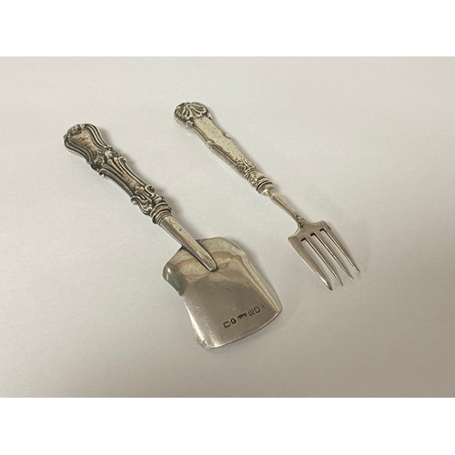 38 - A silver caddy shovel, George Unite, Birmingham 1843, and a silver handled fork by the same maker -