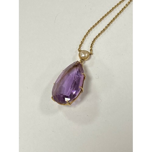 40 - An amethyst and seed pearl necklace, in yellow metal mount -