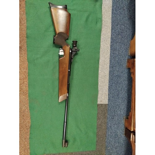 435 - A Feinwerkbau 300S 177 side lever air rifle, with sight and bag -