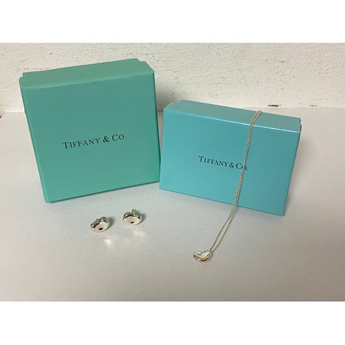 76 - A silver 'bean' necklace and earring suite, signed Elsa Peretti, Tiffany & Co, boxed, with pouches -