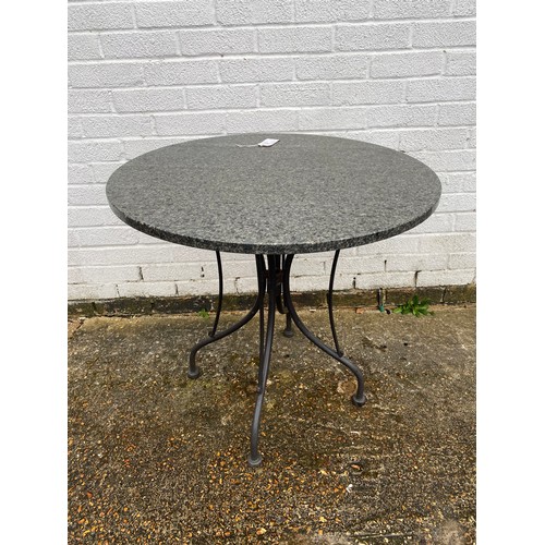 485 - A garden table with circular marble top -