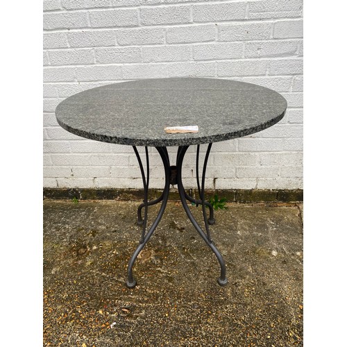 486 - A garden table with circular marble top -