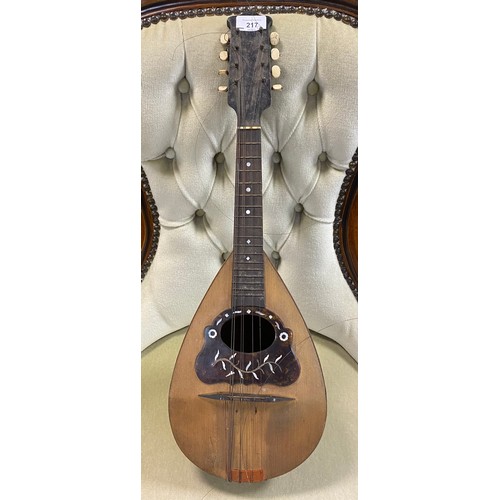 217 - A vintage mandolin, labelled for Barnes & Mullins, London -