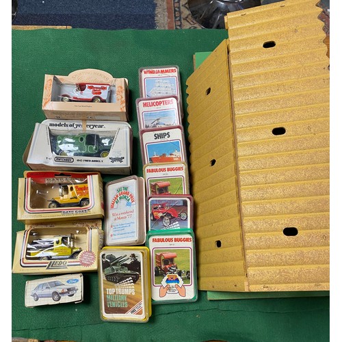 209 - A mixed lot, including vintage Top Trumps card games, farm animals, other toys etc -