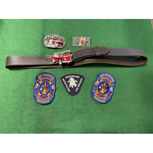 209A - An enamelled fire engine belt buckle on belt, another buckle, patches etc -