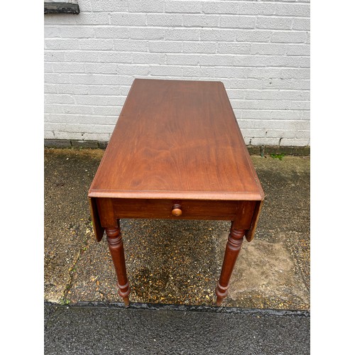 240 - A 19th century mahogany Pembroke style table, with one real and one dummy drawer, on tapering legs -