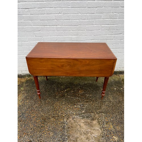 240 - A 19th century mahogany Pembroke style table, with one real and one dummy drawer, on tapering legs -