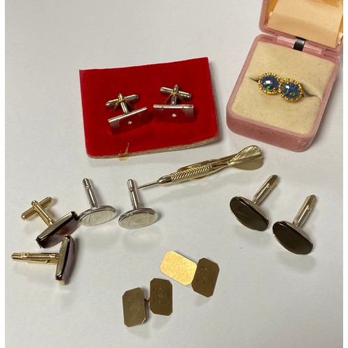 9 - A pair of 9ct gold cufflinks, together with another pair of opal doublet cufflinks and others -