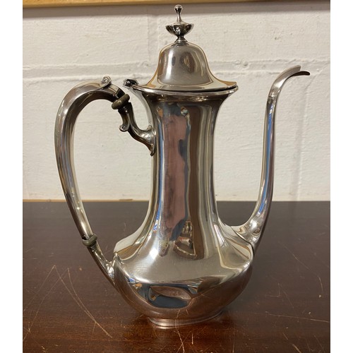 35 - A white metal coffee/water pot, stamped sterling -