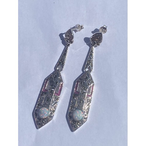 54 - A pair of Art Deco style, silver ear pendants, set with opals and marcasite -