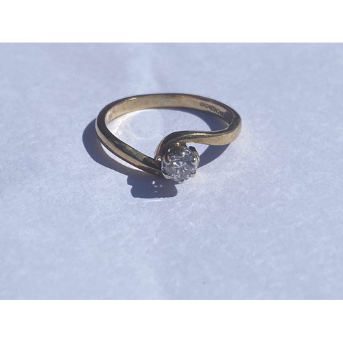 55 - A diamond single stone ring, set in 9ct gold -