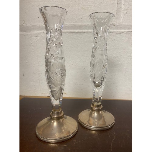 61 - A pair of silver mounted glass bud vases -