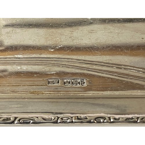 63 - An Art Nouveau silver tray, Sheffield 1901, of elongated octagonal form, with floral detail -