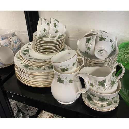 87 - A Colclough part tea and dinner service, decorated with blue flowers and a Duchess Ivy pattern part ... 