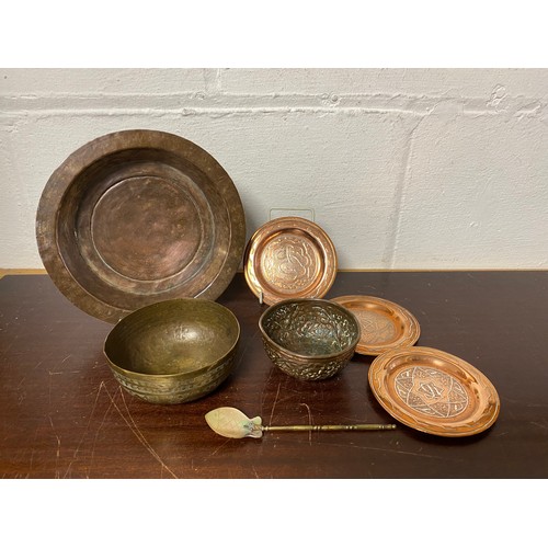 192 - A group of three copper and inlaid Islamic dishes, similar copper bowl etc -