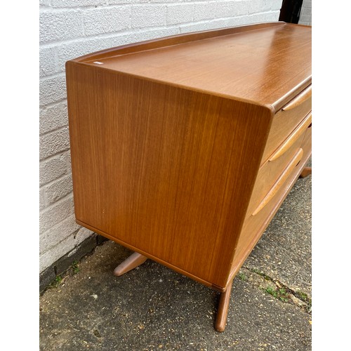 251 - Val Rossi for Beithcraft: a mid century teak sideboard fitted with three drawers and two cupboard do... 