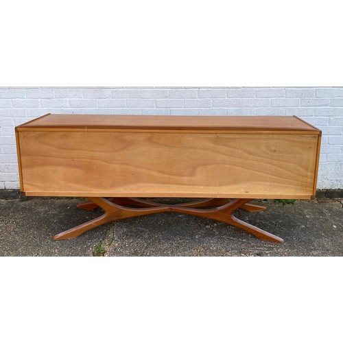 251 - Val Rossi for Beithcraft: a mid century teak sideboard fitted with three drawers and two cupboard do... 