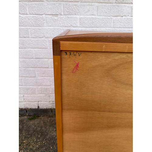 251 - Val Rossi for Beithcraft: a mid century teak sideboard fitted with three drawers and two cupboard do... 