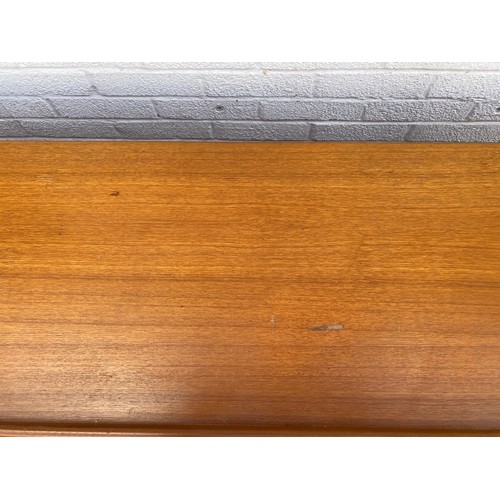 251 - Val Rossi for Beithcraft: a mid century teak sideboard fitted with three drawers and two cupboard do... 