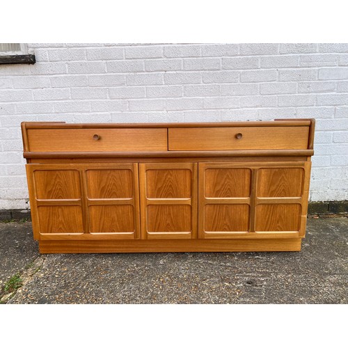 252 - A Nathan teak sideboard, with two drawers over central drawer and cupboard doors, and another smalle... 