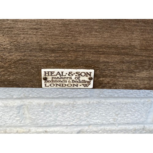 283 - A Heal & Son single bed, with oak head and foot board -