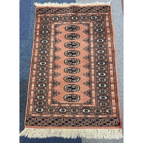 266 - A group of three rugs -