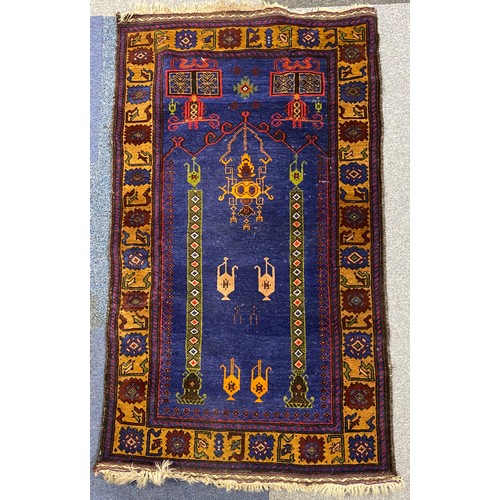 266 - A group of three rugs -