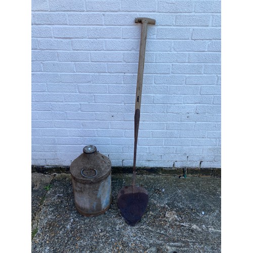A vintage can and a turf spade -