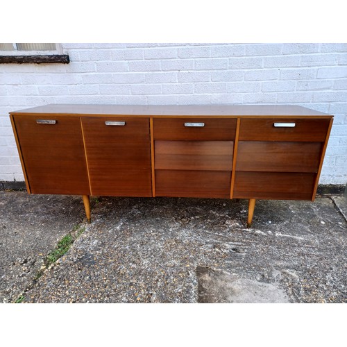 232 - A mid century Avalon 'Beehive' sideboard, fitted with cupboard doors and drawers -