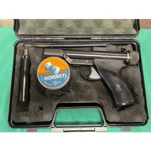 313 - A Hy-Score .177 and .22 interchangeable barrel air pistol, cased -