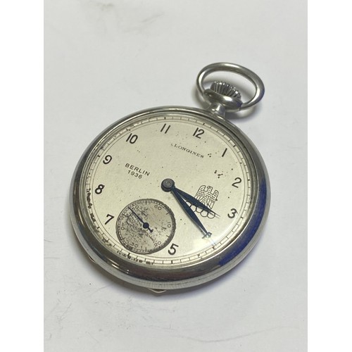 10 - A Longines open face pocket watch, the signed dial bearing Berlin 1936 alongside German eagle above ... 