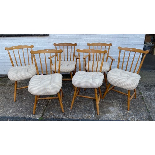 234 - A set of six stick back dining chairs including a pair of carvers -