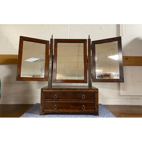 302 - A 19th century mahogany toilet mirror, with three mirrors over a base fitted with two drawers -