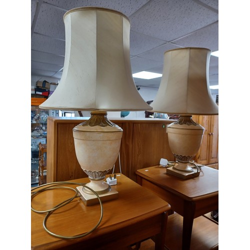 305 - A pair of classical urn style table lamps -