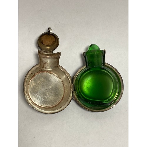 63A - A late Victorian silver cased scent bottle, London 1896, hinged to the top and side to reveal a gree... 